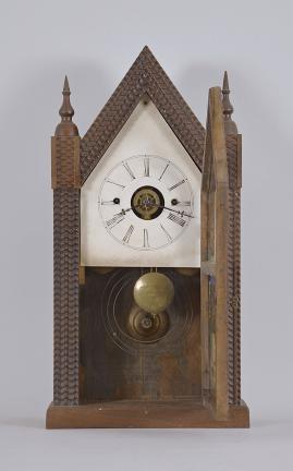 Forestville Manufacturing Co., (J.C. Brown), Forestville, Conn., sharp gothic or steeple clock, 8 day, time and strike with alarm, spring driven brass fusee movement in a rosewood veneered case with rippled molding.
