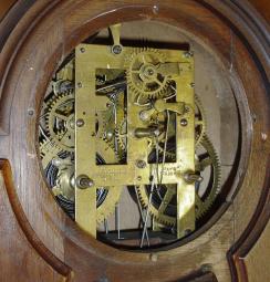 Ithaca Calendar Clock Co., Ithaca, NY, "No. 8 Shelf Library" clock with a spring driven 8 day time and strike movement (E.N. Welch, Forestville, Conn) and a H. B. Horton patented perpetual calendar mechanism in a walnut case.