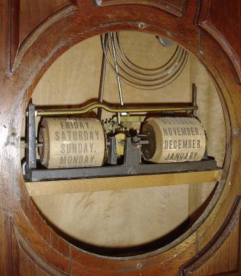 Ithaca Calendar Clock Co., Ithaca, NY, "No. 8 Shelf Library" clock with a spring driven 8 day time and strike movement (E.N. Welch, Forestville, Conn) and a H. B. Horton patented perpetual calendar mechanism in a walnut case.