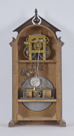 Ithaca Calendar Clock Co., Ithaca, NY, "No. 8 Shelf Library" clock with a spring driven 8 day time and strike movement (E.N. Welch, Forestville, Conn) and a H. B. Horton patented perpetual calendar mechanism in a walnut case.
