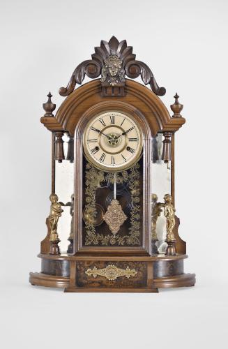 New Haven Clock Co., New Haven, Conn., "Occidental" shelf clock with a spring driven 8 day time, strike and alarm movement in a walnut case