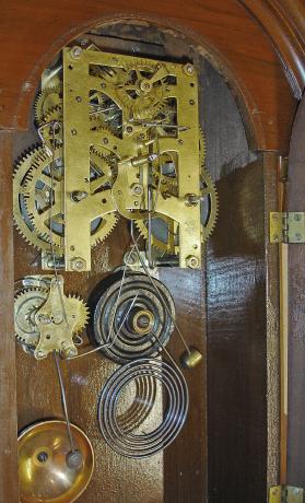 New Haven Clock Co., New Haven, Conn., "Occidental" shelf clock with a spring driven 8 day time, strike and alarm movement in a walnut case