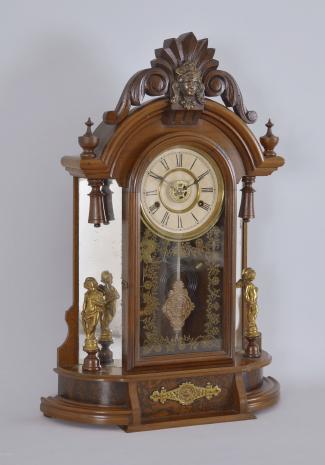 New Haven Clock Co., New Haven, Conn., "Occidental" shelf clock with a spring driven 8 day time, strike and alarm movement in a walnut case