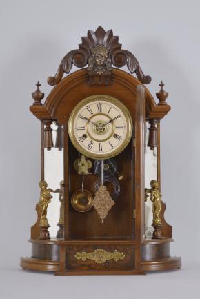 New Haven Clock Co., New Haven, Conn., "Occidental" shelf clock with a spring driven 8 day time, strike and alarm movement in a walnut case