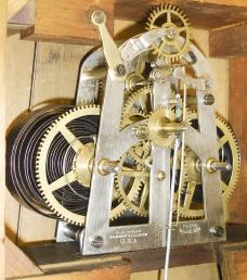 Ithaca Calendar Clock Co., Ithaca, NY, "No. 4 Hanging Office" wall clock with a spring driven 30 day timepiece movement (E.N. Welch) with a H. B. Horton patented perpetual calendar mechanism in a walnut case.