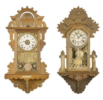 Clocks- 2 (Two): (1) Seth Thomas Clock Co., Thomaston, Conn., "Hanging Eclipse", 8 day, time, strike and alarm spring driven brass movement hanging gingerbread wall clock, c1894 (2) Waterbury Clock Co., Waterbury, Conn., 8 day, time and strike spring driven brass movement unidentified model hanging gingerbread wall clock, c1901