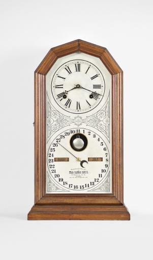 Ithaca Calendar Clock Co., Ithaca, NY "No. 11 Octagon" double dial calendar shelf clock with a spring driven 8 day time and strike movement (E.N. Welch) and a H. B. Horton patented perpetual calendar mechanism in a walnut case.