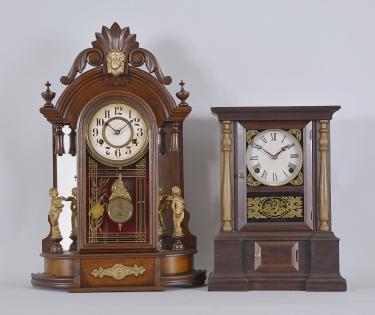 Clocks- 2 (Two): (1) New Haven Clock Co., New Haven, Conn., "Occidental" shelf clock with a spring driven 8 day time and half hour srike movement in a walnut case with mirror sides. (2) Atkins Clock Co., Bristol, Conn., "London" shelf clock with a spring driven 8 day time and strike movement in a rosewood veneered case.