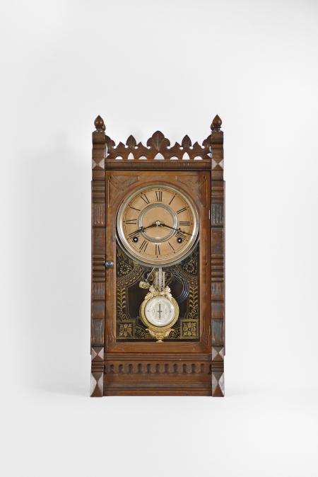 F. Kroeber Clock Co., New York, NY, "Polaris" 8 day, time and strike spring driven brass movement walnut shelf clock with a nicely made shelf.