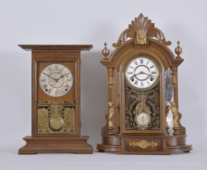Clocks- 2 (Two): (1) Seth Thomas Clock Co., Thomaston, Conn., "Concord" shelf clock with a spring driven 8 day time and strike (cathedral gong) movement in a walnut case, c1885. (2) F. Kroeber, New York, NY, "Occidental" shelf clock with a spring driven 8 day time and strike (cathedral gong) movement in a walnut case, c1880.