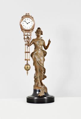 Gebrüder Junghans, Schramberg, Germany, "Elegant" swinging mystery clock, 8 day, time only, spring driven movement contained in a compound pendulum held aloft by a female figure in flowing dress, arabic numeral white enamel dial, and blued steel hands.