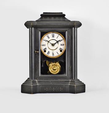 E. Ingraham & Co., Bristol, Conn., "Domino" mantel clock, 8 day, time and strike, spring driven brass movement in a black enameled wood case, papered dial, black steel hands