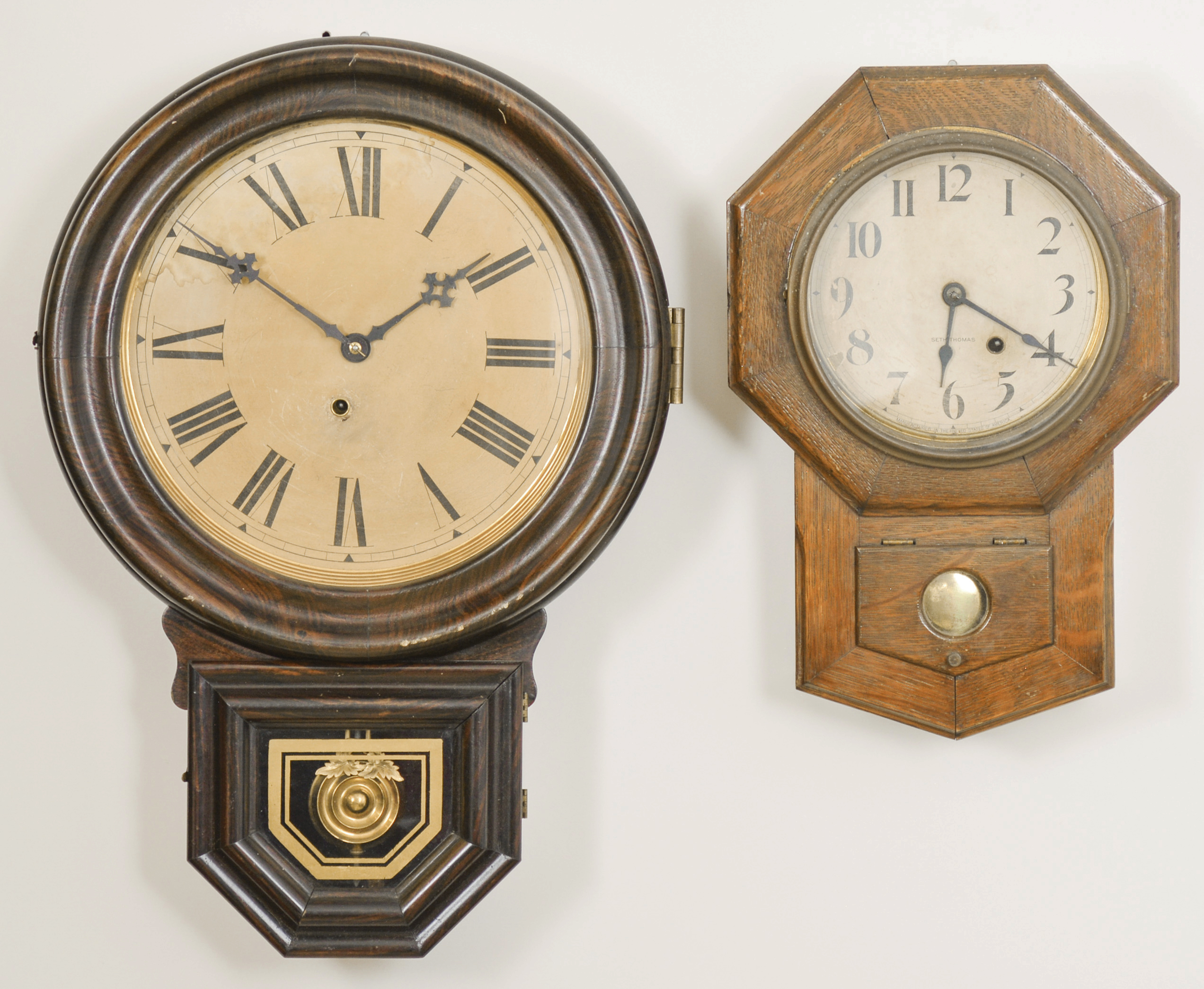 Eight School house clocks by Seth Thomas, Ingraham, Waterbury and Ansonia