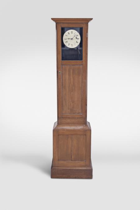 Clocks- 2 (Two): (1) Howard & Davis, Boston, Mass., "Watch Clock", softwood case with simple molded base, inset panels in base and trunk door and molded cornice, roman numeral white painted metal dial, brass 8 day timepiece movement with trapezoidal plates and turned pillars, ebonized wooden pendulum rod, damascened, brass clad, cast iron pendulum bob, and brass clad weight, c1860; (2) E. Howard & Co., Boston, Mass., hanging watch clock similar to the No. 26, rectilinear walnut case with molded cornice and applied crest, the door with molded glazed aperture for viewing the time recorder mechanism, roman numeral white painted metal dial, damascened 8 day timepiece movement, wooden pendulum rod with damascened brass clad pendulum bob, and cast iron weight, c1875.