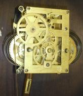 New Haven Clock Co., New Haven, Conn., Unidentified model, 30 day, spring driven brass double wind movement double dial wall calendar clock. We did not find this model in the catalog as it may have been a special order as New Haven did produce clocks for other firms such as the American Ringer Co., New York.