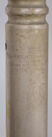 Herschede Hall Clock Co., Cincinnati, Ohio, hall clock, 8 day, time, strike and chime on five tubular bells, three brass weight driven movement in a mahogany case with arched top with central carved cartouche and applied carvings, full columns with carved capitals flanking hood door over trunk door with beveled glass and carved fan top flanked by full columns with carved capitals on base with large applied carving resting on paw feet. The brass dial has silvered chapter ring, subsidiary seconds, strike / silent and chime / silent discs, engraved brass spandrels and dial center, applied brass numerals and moon phase indicator.