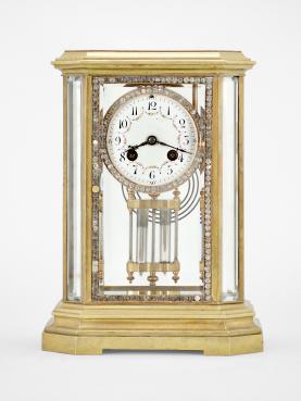 S. Marti, Paris, France, crystal regulator, 8 day, time and strike, spring driven pendule de Paris movement in a brass case with glazed canted corners, molded base and cornice, door and bezels outlined with brilliants, arabic numeral white enamel dial with polychrome floral garlands inside the numbers, blued steel hands and two-vial compensating pendulum.