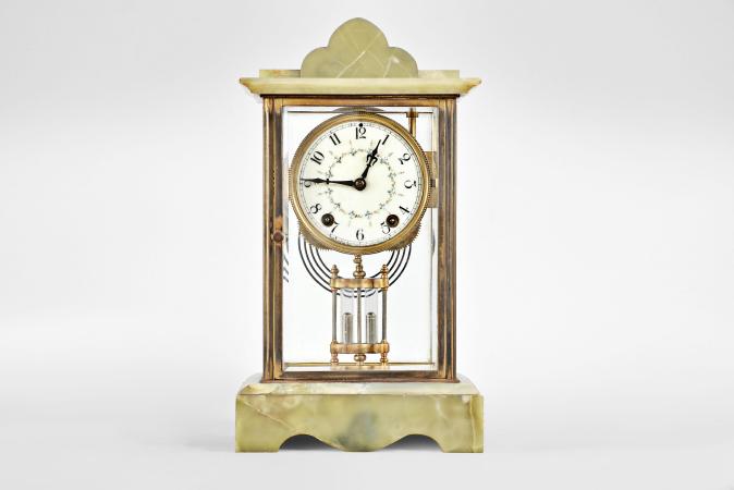 New Haven Clock Co., New Haven, Conn., "Thopas" crystal regulator, 8 day, time and strike, spring driven movement in glazed case with green onyx base, cornice, and pediment, arabic numeral white enamel dial with polychrome garlands, black steel hands.