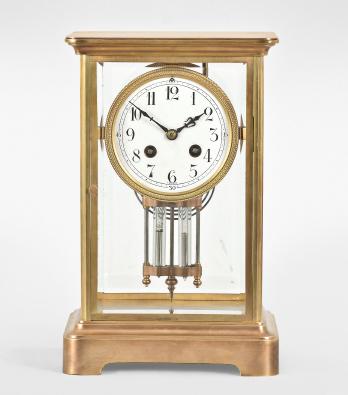 Japy Frères & Cie., Paris, France, for Spaulding & Co., Chicago, crystal regulator, 8 day, time and strike, spring driven pendule de Paris movement with compensating pendulum in a glazed polished brass case, cast bezel, arabic numeral white enamel dial, and blued steel hands.