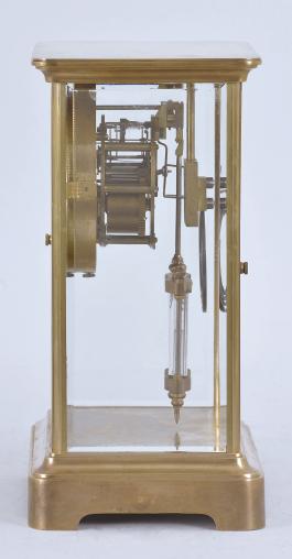 Japy Frères & Cie., Paris, France, for Spaulding & Co., Chicago, crystal regulator, 8 day, time and strike, spring driven pendule de Paris movement with compensating pendulum in a glazed polished brass case, cast bezel, arabic numeral white enamel dial, and blued steel hands.
