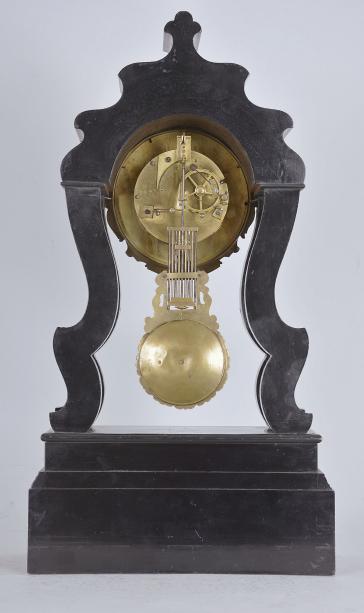 France, portico clock, 8 day, time and strike, spring driven movement with countwheel strike in an ebonized case with curved silhouette and stepped and molded base, the case front with abundant flower and scroll inlay of brass, tortoise shell, colored enamels and mother of pearl, heavy cast brass bezel surrounding a roman numeral white enamel dial, fancy pierced brass hands, and matching cast brass pendulum with faux gridiron.