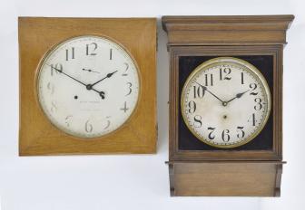 Clocks- 2 (Two) Wall Clocks: (1) Seth Thomas Clock Co., Thomaston, Conn., "Office No. 11" hanging clock with a spring driven double wind 30 day timepiece movement (86T) in an oak case; (2) Sessions Clock Co., Forestville, Conn., "Sentinal" wall clock with a spring driven 8 day timepiece movement in a mahogany finished softwood case.