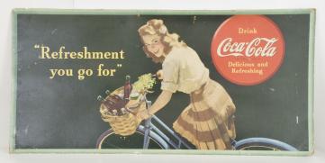 Coca-Cola Advertising- 2 (Two) large lithographed Coca-Cola advertisements on cardboard, featuring young women, one model reclining on the beach, captioned "What I want is a Coke" and another on a bicycle, claiming "Refreshment you go for"