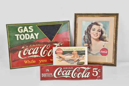 Coca-Cola Advertising- 4 (Four) items: (1) American Art Works Inc, Coshocton, Ohio, painted metal sign measuring 27" x 19" with raised letters reading "Gas Today / Drink Coca-Cola / While You Wait" with black triangle where the price of gas could be written in chalk; (2) The Elwood Myers Co., Springfield, Ohio, early "Drink Coca-Cola in Bottles" painted metal sign measuring 6" x 23"; (3) Printed Coca-Cola advertising page featuring a young woman at the beach reading "Completely Refreshing" and "The Taste That Charms and Never Cloys", 10.5" x 14"; (4) Framed Coca-Cola advertisement featuring a portrait of a young woman