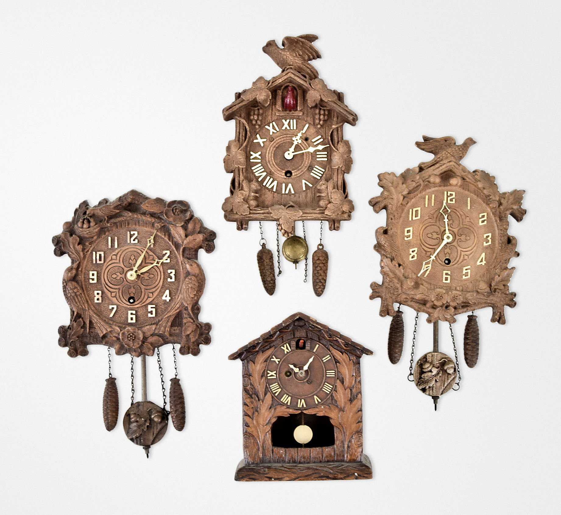 Eight assorted cuckoo style clocks by Lux Clock Mfg Co.