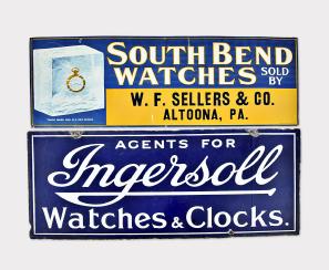 Trade signs- 2 (Two), the first a lithographed sheet metal sign advertising South Bend pocket watches, the predominant colors blue and yellow, with image of a South Bend watch in a block of ice, and announcing "South Bend Watches Sold By W. F. Sellers & Co., Altoona, Pa., the other a blue and white, two sided enamel sign, "Agents For Ingersoll Watches And Clocks", enamel sign dimensions listed
