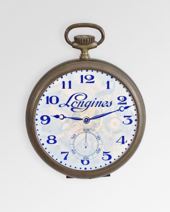 Longines, Switzerland, an interesting pocket watch form trade sign, brass case with steel back, arabic numeral, white painted glass dial with movement printed on reverse, and showing through the dial when the lamp is on