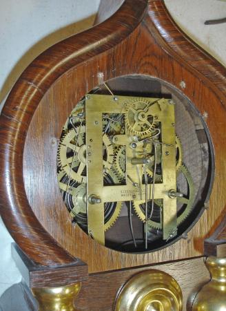 E. Ingraham & Co., Bristol, Conn., "Oriental" shelf clock with a spring driven 8 day time and strike movement in a rosewood veneered case.