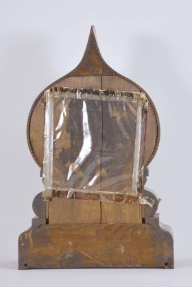 E. Ingraham & Co., Bristol, Conn., "Oriental" shelf clock with a spring driven 8 day time and strike movement in a rosewood veneered case.
