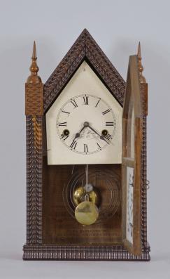 Forestville Manufacturing Co., J.C. Brown, Bristol, Conn., 30 hour, time and strike spring driven brass movement ripple front mini sharp gothic or steeple clock.