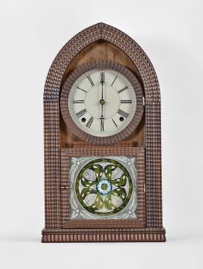 Label says New Haven Clock Co., but likely back and label from a later New Haven beehive clock. 8 day, time and strike spring driven brass movement. Ripple front round gothic or beehive case. Ripple clocks were almost entirely made by the Forestville Mfg Co., J.C. Brown and E.N. Welch Mfg. Co.
