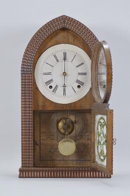 Label says New Haven Clock Co., but likely back and label from a later New Haven beehive clock. 8 day, time and strike spring driven brass movement. Ripple front round gothic or beehive case. Ripple clocks were almost entirely made by the Forestville Mfg Co., J.C. Brown and E.N. Welch Mfg. Co.