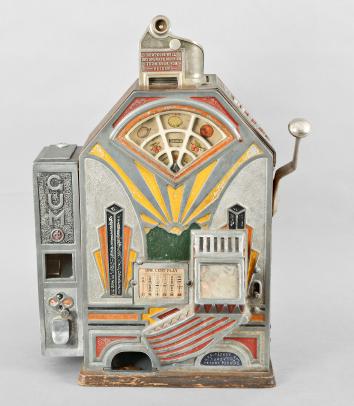 Jennings & Co., Chicago, Illinois, “Little Duke” Penny Slot Machine with classic Art Deco styling, three window jack pot display with fruit on rotating wheel, nickel plated case with polychrome painted highlights and quarter sawn oak rear, sides and bottom including a rare side gum vendor
