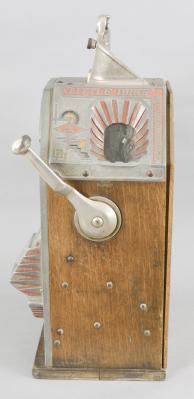 Jennings & Co., Chicago, Illinois, “Little Duke” Penny Slot Machine with classic Art Deco styling, three window jack pot display with fruit on rotating wheel, nickel plated case with polychrome painted highlights and quarter sawn oak rear, sides and bottom including a rare side gum vendor