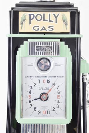 Tokheim Manufacturing Co., Fort Wayne, Indiana, "Polly" gas pump / fuel dispenser in green and black painted cast iron frame with chrome highlights, clock dial gauges on front and back with chrome nozzle and backlit globe top with Polly emblems on globe, reverse painted glasses under globe and under clock dials