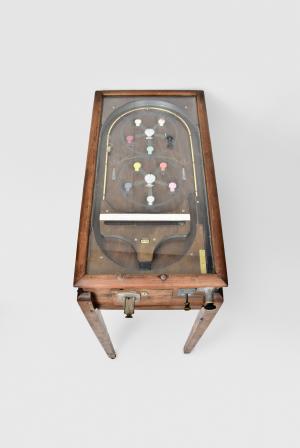 Arcade games- 2 (Two): an early mechanical (no electronics) "Big Broadcast" pinball machine playing seven balls for a penny, theme of great American cities, dated 1924, and a Japanese Pachinko gaming machine in custom case