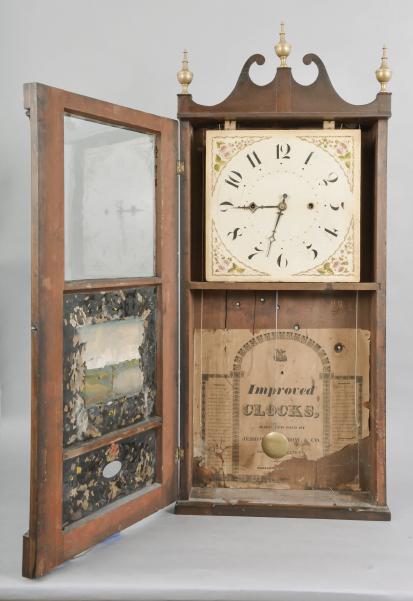 Jerome, Darrow & Co., Bristol, Conn., Reeded Pilaster and Scroll shelf clock with a weight driven 30 hour time and strike movement (groaner) in a mahogany case.