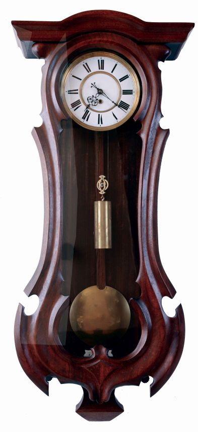 Remember, Ebensee, Austria, hanging regulator, walnut and walnut veneer case with carved serpentine front, Roman numeral white enamel dial, blued steel hands, 8 days weight driven timepiece movement, c1880