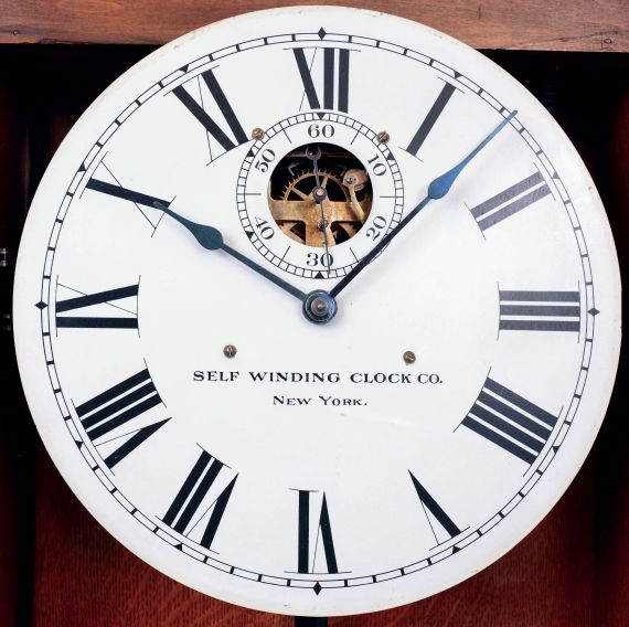 Self Winding Clock Co., New York, oak cased wall timepiece, model # 18-A, with exposed escapement, c1910