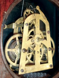 Welch, Spring & Co., Forestville, Conn., "Regulator No. 4" hanging clock in a walnut case with a spring driven, double wind 30 day timepiece movement, c1874.