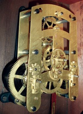 Seth Thomas Clock Co., Thomaston, Conn., "World" wall clock in oak case. 15 day, spring driven, double wind time only movement, c1909.