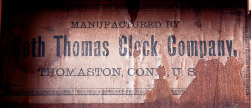 Seth Thomas Clock Co., Thomaston, Conn., "World" wall clock in oak case. 15 day, spring driven, double wind time only movement, c1909.