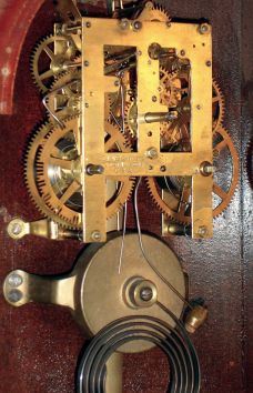 E.N. Welch Mfg. Co., Forestville, Conn., "Meyerbeer", wall clock, 8 days, time and strike, on cathedral gong, spring driven movement in a walnut case with papered metal dial and silk screened glass, c1892
