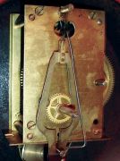 New Haven Clock Co., New Haven, Conn.; "Willard", 8 days, weight driven brass movement banjo timepiece with bracket, c1925
