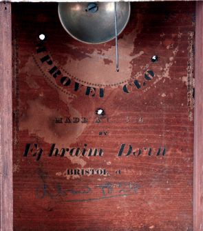 Ephraim Downs, Bristol, Conn., mahogany carved column and splat shelf clock with 30 hours, time and strike, weight driven wood movement, c1828.