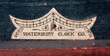 Waterbury Clock Co., Waterbury, Conn., "Crane" model advertising wall clock with an 8 days, spring driven brass timepiece movement, c1912.